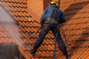 Man Cleaning Roof in Gold Coast