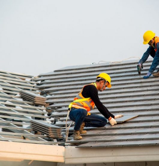 Workers On Top Of Roof - Steep Roof Work In Byron Bay, NSW